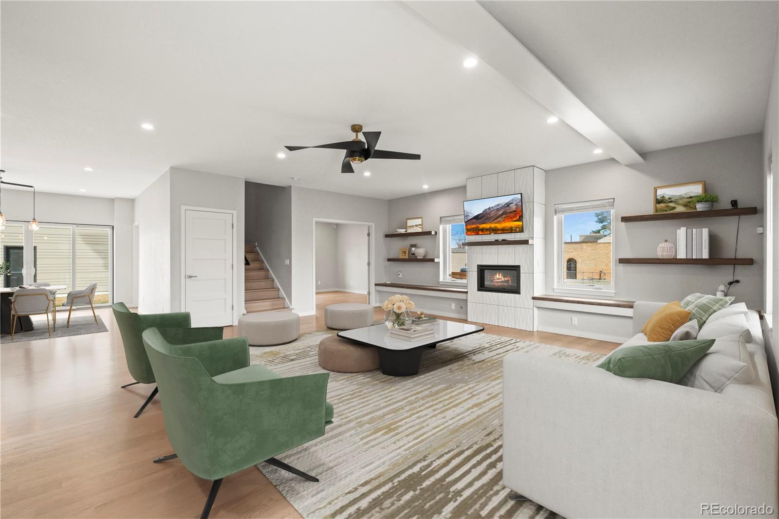 Virtually staged an open living space with digitally added furnishings